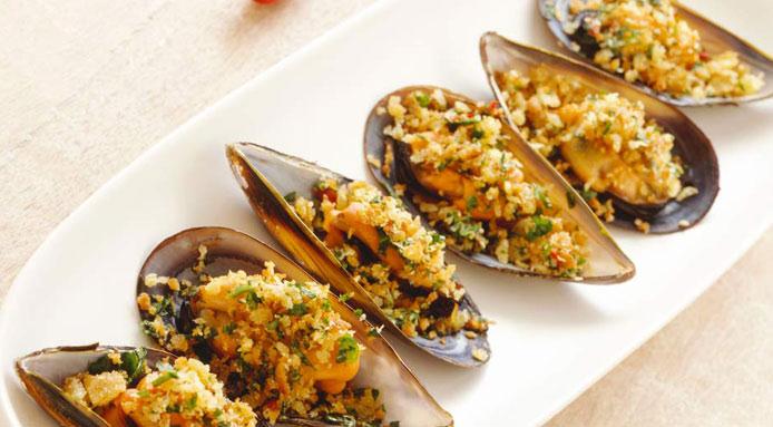 Cuocere le cozze al forno