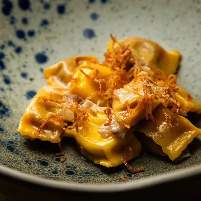 Glass Hostaria_Ravioli del Plin all’amatriciana e guanciale croccante