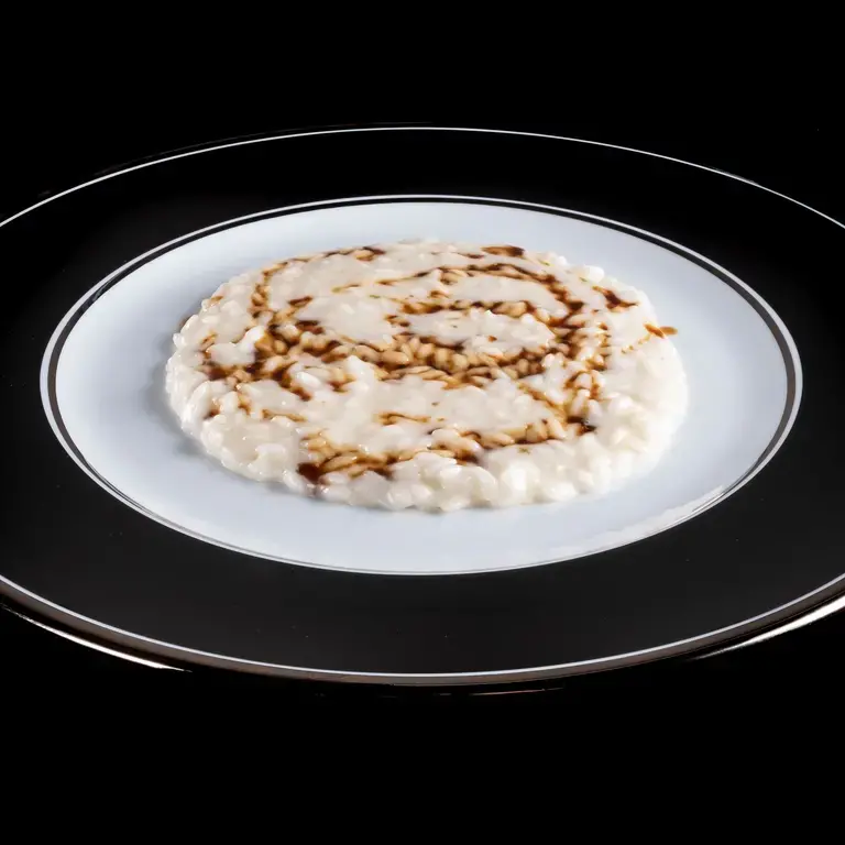 L'imbuto_riso croste di parmigiano e fondo di cipolla