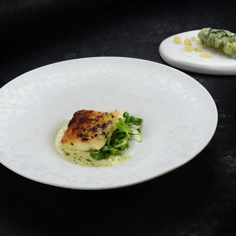 Ricetta Cuore di Baccalà in crosta di pane lardo e grue di cacao salsa al lume e insalata di fave fresche di chef Di Murro