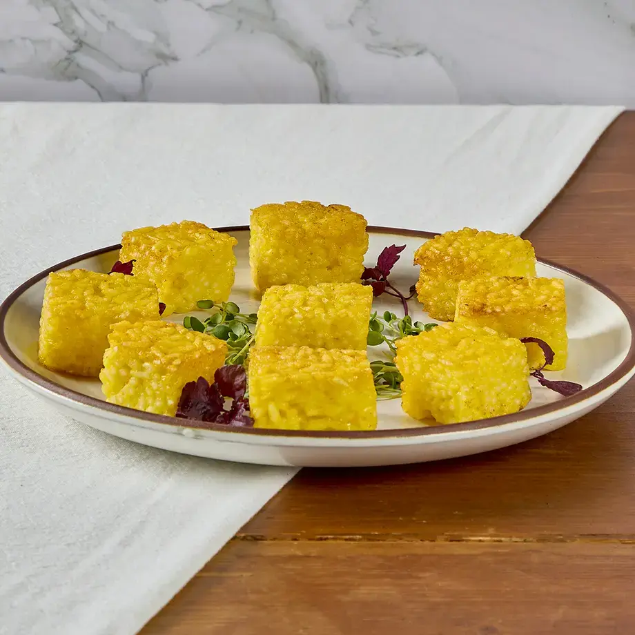 Mini risotti al salto con fonduta di grana