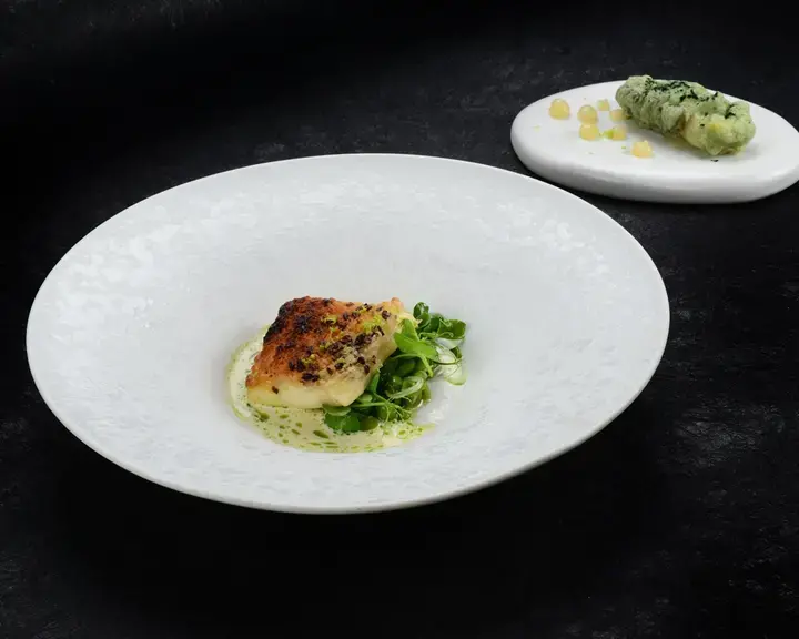 Ricetta Cuore di Baccalà in crosta di pane lardo e grue di cacao salsa al lume e insalata di fave fresche di chef Di Murro