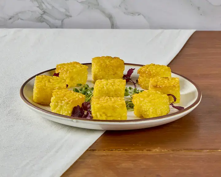 Mini risotti al salto con fonduta di grana